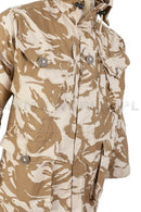Close-up of original British army desert camo jacket with multiple buttoned pockets and hooded windproof design