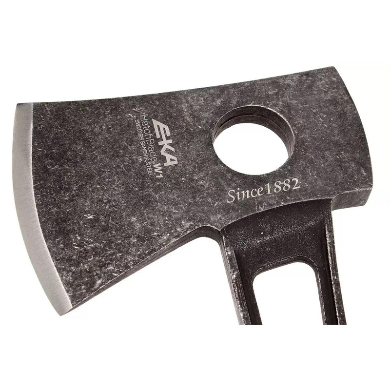Close-up of EKA HatchBlade W1 hatchet head with 12C27 steel blade and finger hole for precision grip.