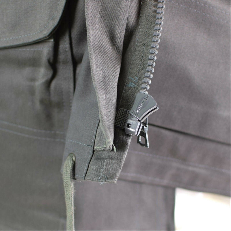 Close-up of durable zipper and fabric detail on genuine Danish Army Combat Jacket M71 in military grey.