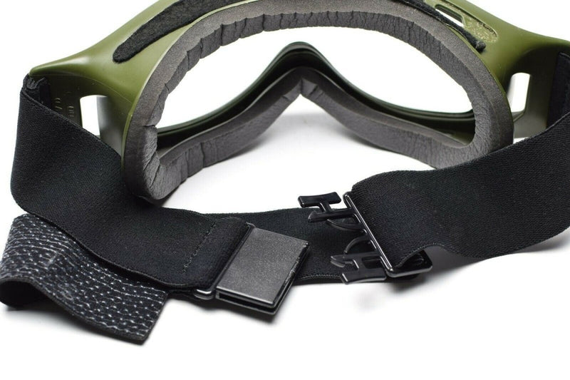 Genuine Dutch military goggles with flexible rubber frame and adjustable black strap for sun, sand, and wind protection.