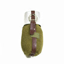 Vintage Romanian army metal canteen with olive wool felt cover and brown leather strap, like new condition.