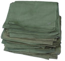 Stack of green fabric scarves on a white background