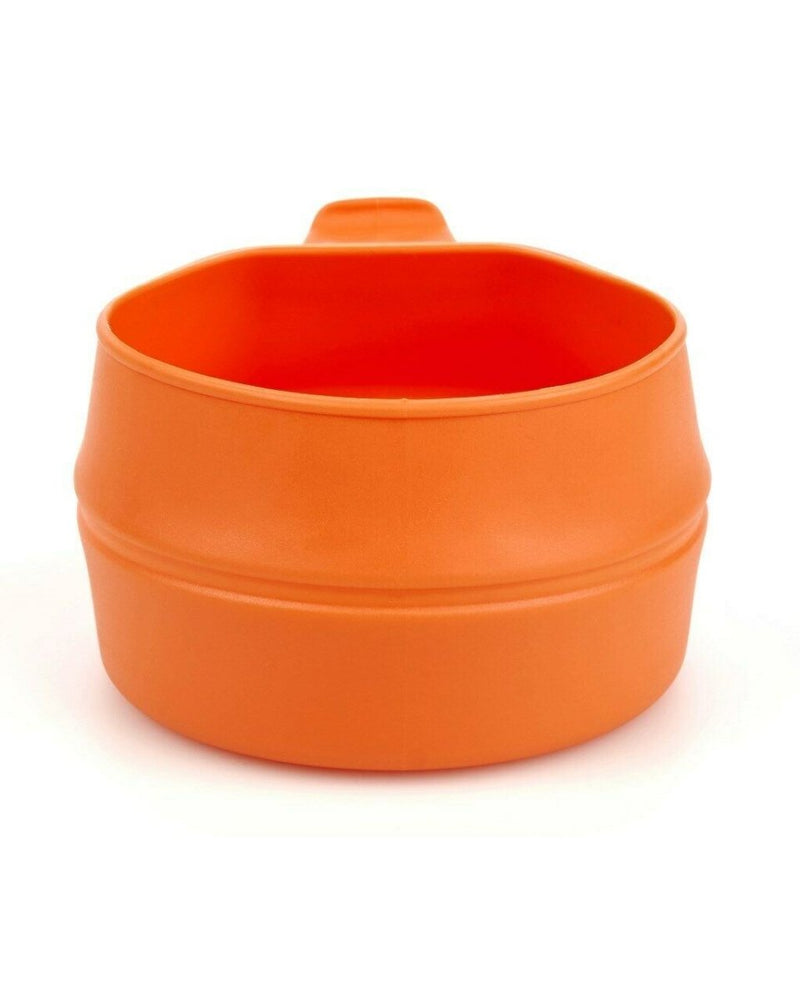 Orange Wildo foldable camping cup expanded for outdoor use and easy portability.