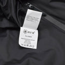 Close-up of MFH thermal jacket label showing 100% nylon outer material and polyester lining with care instructions.