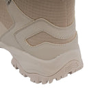 Close-up of the durable coyote-colored MIL-TEC tactical hiking boot outsole and heel with nonslip tread design.