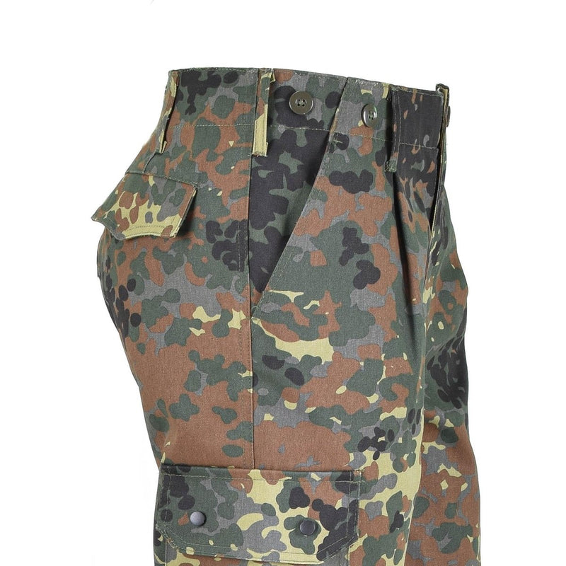Close-up of Mil-Tec Flecktarn camo cargo field pants with multiple pockets and durable fabric.