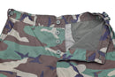 Close-up of Mil-Tec U.S Army style ripstop BDU cargo pants in woodland camouflage with button fly open