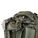 Green MIL-TEC Commando hiking backpack with waterproof rain cover partially pulled out, showing tactical design and durability.