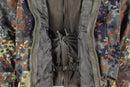 Close-up of Mil-Tec German army Flecktarn camo parka showing zipper and detachable fleece liner inside
