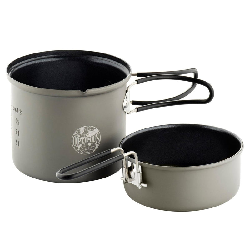 Optimus Elektra FE camping cookware set with non-stick pans and foldable handles for outdoor cooking and backpacking use