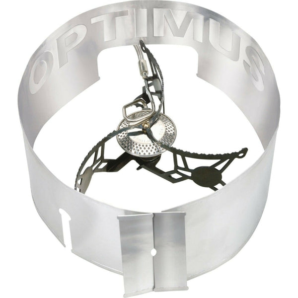 Lightweight Optimus Vega folding camp stove burner with built-in windshield for portable outdoor cooking.