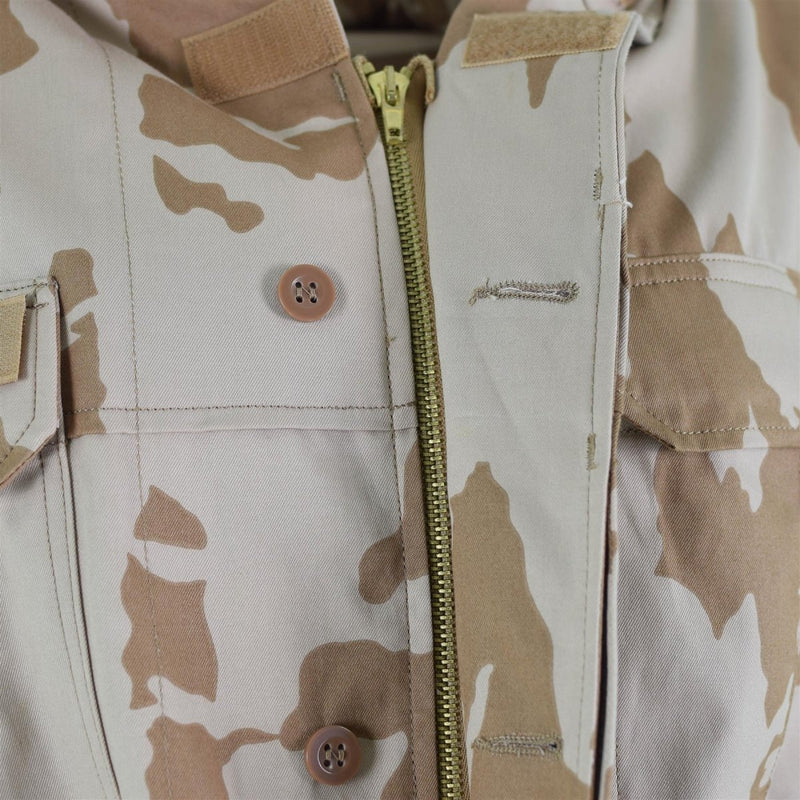 Close-up of original Czech army desert camo parka jacket showing zipper, buttons, and fabric details