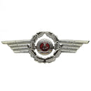 Original East German NVA DDR army military cap hat cockade pin badge with winged silver wreath and red emblem center