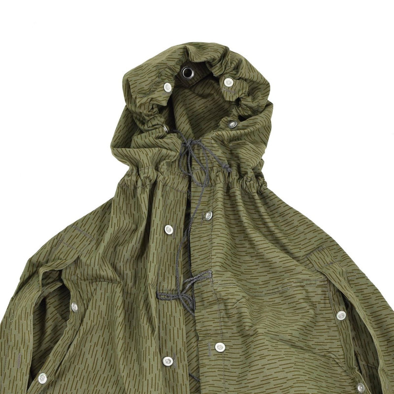 East Germany NVA shelter half with raindrop camouflage, hooded waterproof canvas, buttoned for versatile military use.