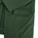 Close-up of green Original German police officer parka showing quilted liner, zipper, and buttoned pockets on windproof jacket