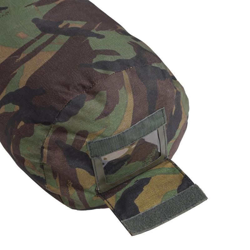 Close-up of original Netherlands military camo waterproof compression storage bag for camping gear and sleeping bags.