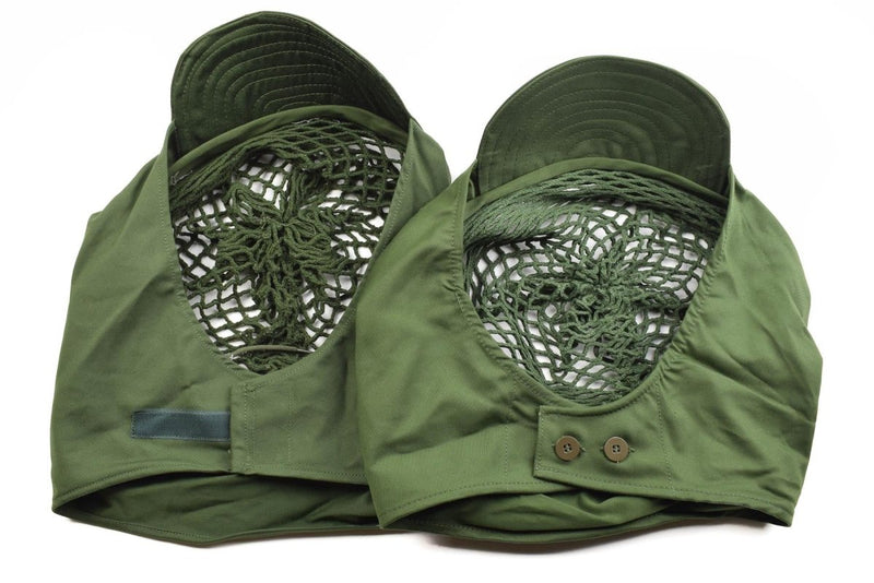 Two green original Swedish army helmet net covers with attached chin straps and ventilation mesh inside