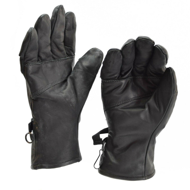Pair of original US Army black leather combat gloves with insulated lining and wrist straps for secure fit
