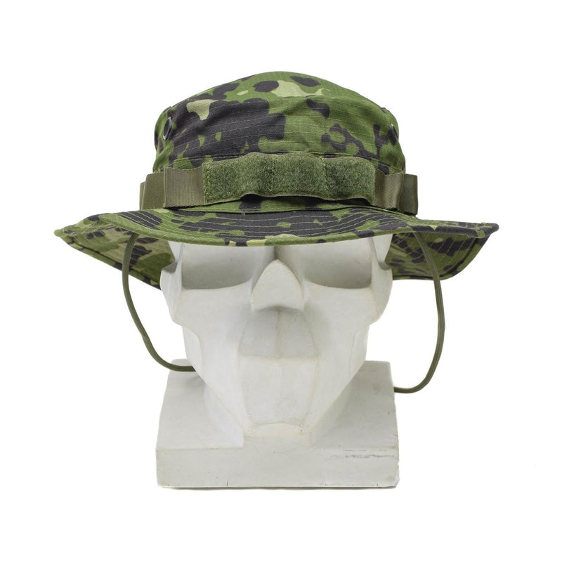Danish M84 camo boonie hat with wide brim, vent holes, chinstrap, and ripstop fabric on white mannequin head.