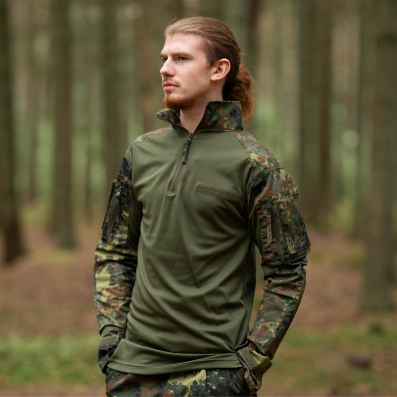Man wearing TACGEAR German Army style Flecktarn camo combat shirt standing in a forest setting